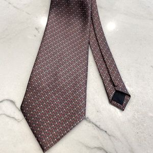 A. Mahtani 100% Italian Silk tie.  Grey with red and pink box grid pattern.